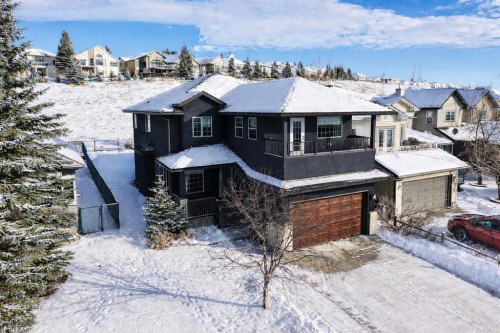 187 Gleneagles View, Cochrane, AB - Outdoor With Facade