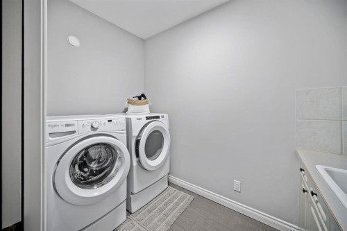 187 Gleneagles View, Cochrane, AB - Indoor Photo Showing Laundry Room