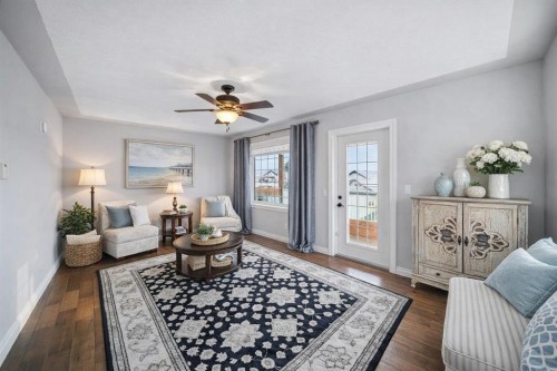 187 Gleneagles View, Cochrane, AB - Indoor Photo Showing Living Room
