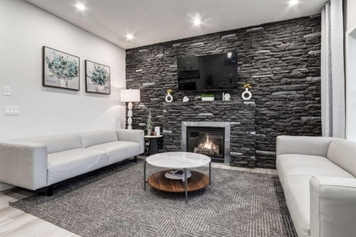 110 Sage Bank Grove Nw, Calgary, AB - Indoor Photo Showing Living Room With Fireplace