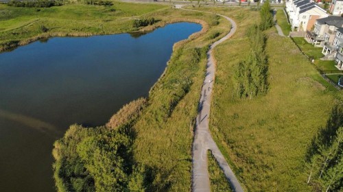503 Nolanfield Villas Nw, Calgary, AB - Outdoor With Body Of Water With View