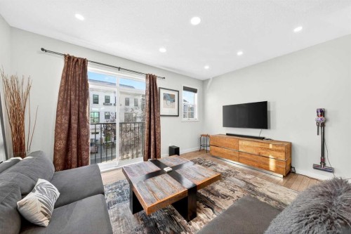 503 Nolanfield Villas Nw, Calgary, AB - Indoor Photo Showing Living Room