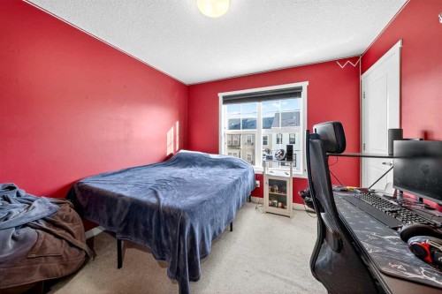 503 Nolanfield Villas Nw, Calgary, AB - Indoor Photo Showing Bedroom