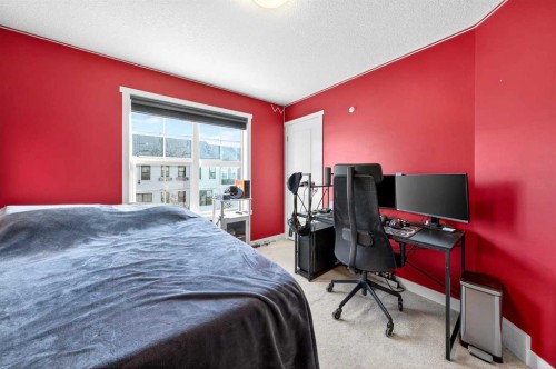 503 Nolanfield Villas Nw, Calgary, AB - Indoor Photo Showing Bedroom