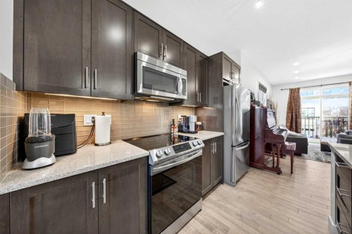 503 Nolanfield Villas Nw, Calgary, AB - Indoor Photo Showing Kitchen With Stainless Steel Kitchen With Upgraded Kitchen