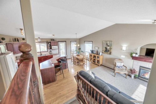 102 Parklane Drive, Strathmore, AB - Indoor Photo Showing Living Room With Fireplace