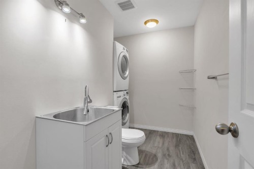 106 Ranch Ridge Meadow, Strathmore, AB - Indoor Photo Showing Laundry Room