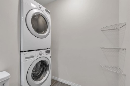 106 Ranch Ridge Meadow, Strathmore, AB - Indoor Photo Showing Laundry Room