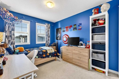 90 Walden Crescent Se, Calgary, AB - Indoor Photo Showing Bedroom