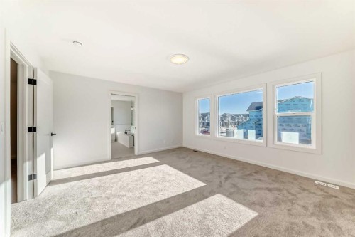 63 Creekside Path Sw, Calgary, AB - Indoor Photo Showing Other Room