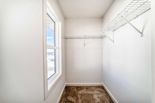 63 Creekside Path Sw, Calgary, AB - Indoor Photo Showing Other Room