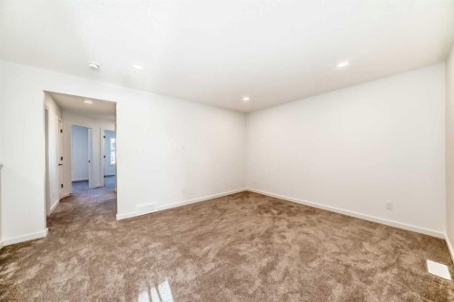 63 Creekside Path Sw, Calgary, AB - Indoor Photo Showing Other Room
