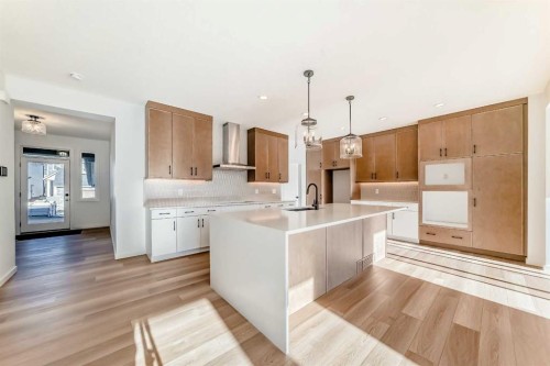 63 Creekside Path Sw, Calgary, AB - Indoor Photo Showing Kitchen