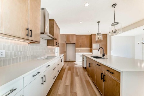 63 Creekside Path Sw, Calgary, AB - Indoor Photo Showing Kitchen With Upgraded Kitchen