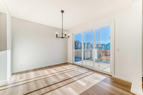 63 Creekside Path Sw, Calgary, AB - Indoor Photo Showing Other Room