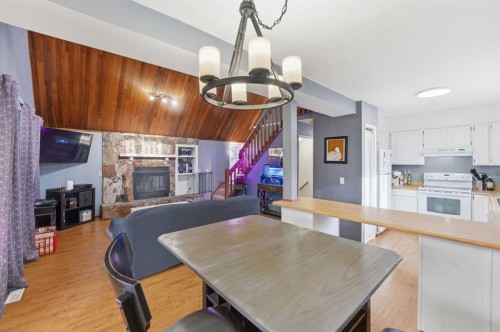 1429 Big Springs Way Se, Airdrie, AB - Indoor With Fireplace