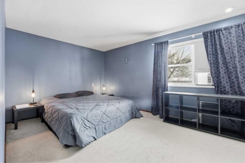 1429 Big Springs Way Se, Airdrie, AB - Indoor Photo Showing Bedroom