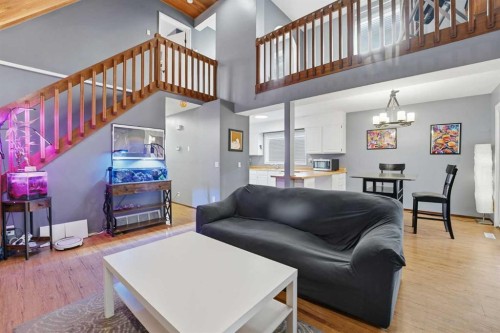 1429 Big Springs Way Se, Airdrie, AB - Indoor Photo Showing Living Room