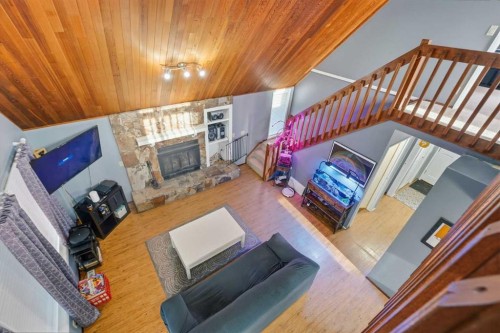 1429 Big Springs Way Se, Airdrie, AB - Indoor With Fireplace