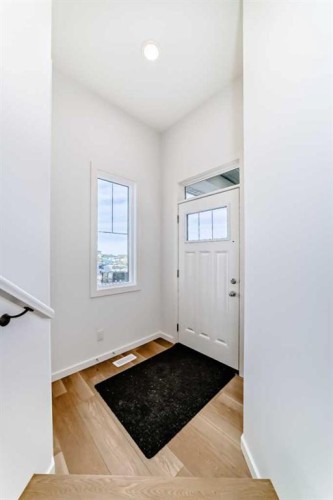 44 Creekside Path Sw, Calgary, AB - Indoor Photo Showing Other Room