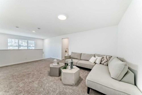 44 Creekside Path Sw, Calgary, AB - Indoor Photo Showing Living Room
