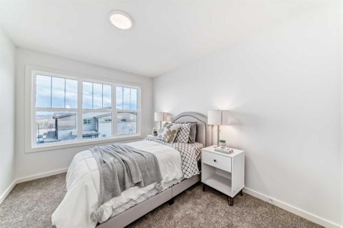 44 Creekside Path Sw, Calgary, AB - Indoor Photo Showing Bedroom