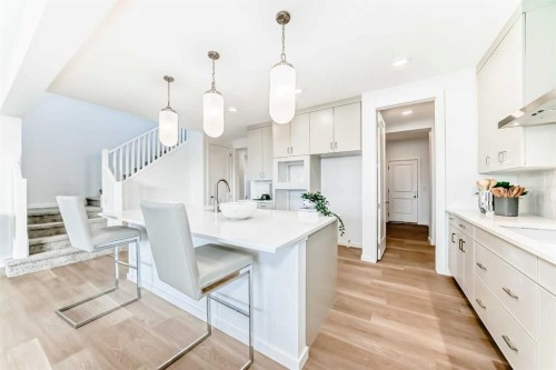 44 Creekside Path Sw, Calgary, AB - Indoor Photo Showing Kitchen With Upgraded Kitchen