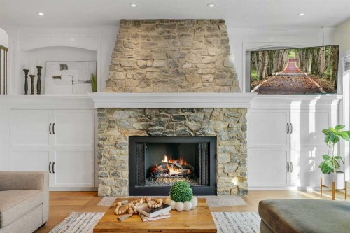 5852 Bowwater Crescent Nw, Calgary, AB - Indoor Photo Showing Living Room With Fireplace