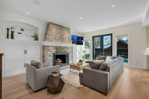 5852 Bowwater Crescent Nw, Calgary, AB - Indoor Photo Showing Living Room With Fireplace