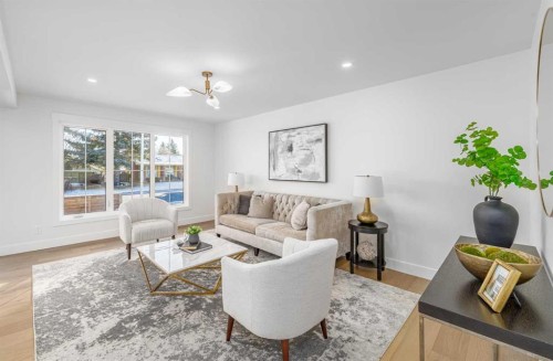 1152 Lake Sundance Crescent Se, Calgary, AB - Indoor Photo Showing Living Room