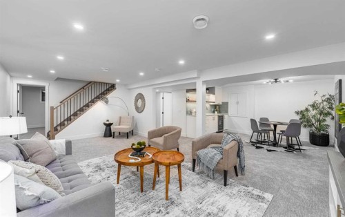 1152 Lake Sundance Crescent Se, Calgary, AB - Indoor Photo Showing Living Room