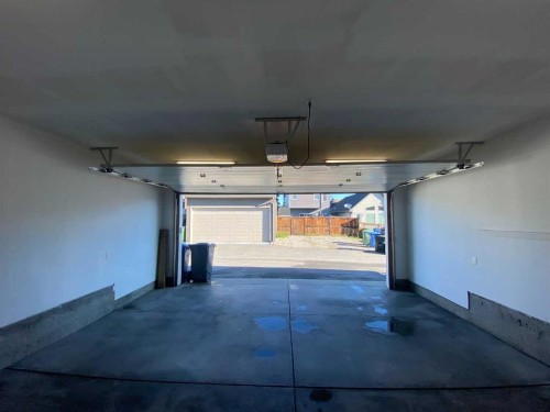 48 Auburn Bay Crescent Se, Calgary, AB - Indoor Photo Showing Garage