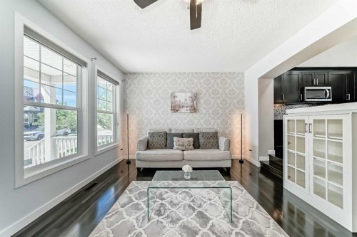 48 Auburn Bay Crescent Se, Calgary, AB - Indoor Photo Showing Living Room