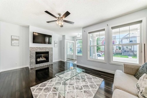 48 Auburn Bay Crescent Se, Calgary, AB - Indoor Photo Showing Living Room With Fireplace
