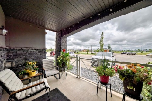 111-1005B Westmount Drive, Strathmore, AB - Outdoor With Deck Patio Veranda With Exterior
