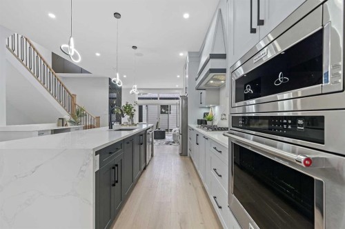 107 Hartford Road Nw, Calgary, AB - Indoor Photo Showing Kitchen With Upgraded Kitchen
