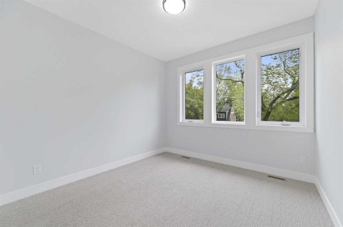 107 Hartford Road Nw, Calgary, AB - Indoor Photo Showing Other Room