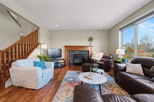 39 Elgin Estates Green Se, Calgary, AB - Indoor Photo Showing Living Room With Fireplace