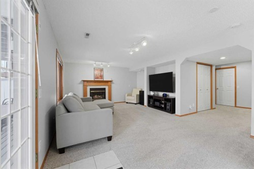 175 Macewan Park Circle Nw, Calgary, AB - Indoor With Fireplace