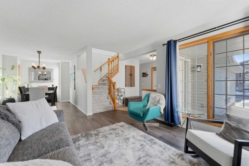 175 Macewan Park Circle Nw, Calgary, AB - Indoor Photo Showing Living Room