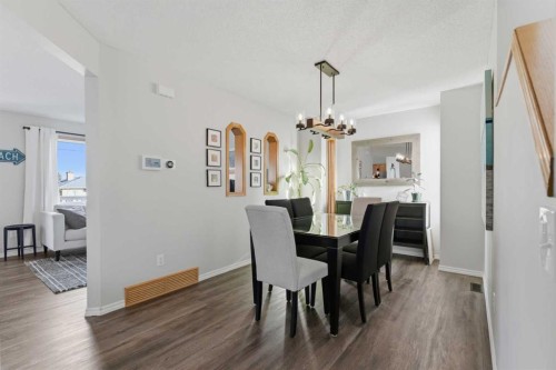 175 Macewan Park Circle Nw, Calgary, AB - Indoor Photo Showing Dining Room