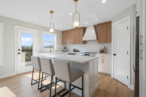 335 Hidden Creek Boulevard Nw, Calgary, AB - Indoor Photo Showing Kitchen With Upgraded Kitchen