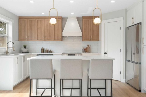 335 Hidden Creek Boulevard Nw, Calgary, AB - Indoor Photo Showing Kitchen With Upgraded Kitchen