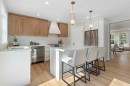 335 Hidden Creek Boulevard Nw, Calgary, AB  - Indoor Photo Showing Kitchen With Upgraded Kitchen 