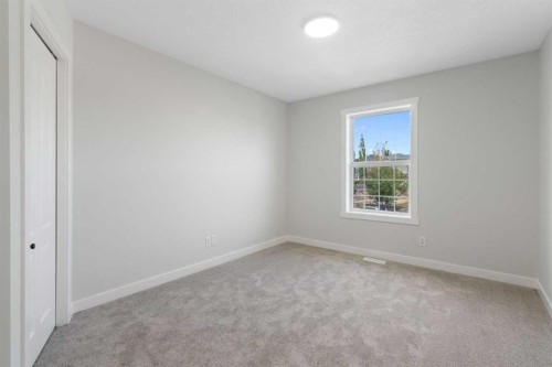 335 Hidden Creek Boulevard Nw, Calgary, AB - Indoor Photo Showing Other Room