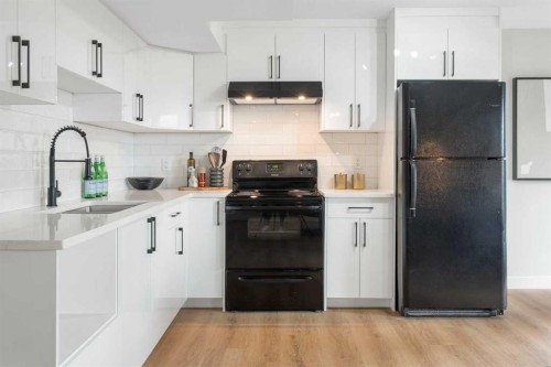 335 Hidden Creek Boulevard Nw, Calgary, AB - Indoor Photo Showing Kitchen With Upgraded Kitchen