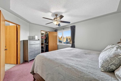 1336 Meadowbrook Drive Se, Airdrie, AB - Indoor Photo Showing Bedroom