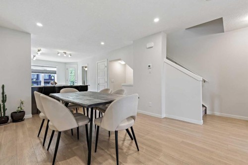 107-474 Seton Circle Se, Calgary, AB - Indoor Photo Showing Dining Room
