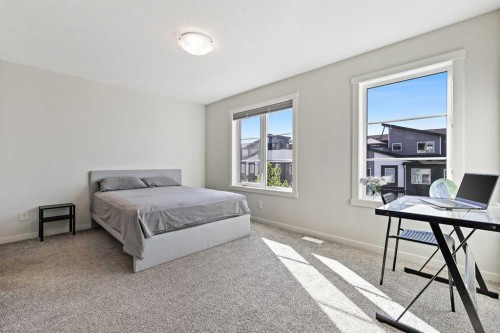 107-474 Seton Circle Se, Calgary, AB - Indoor Photo Showing Bedroom