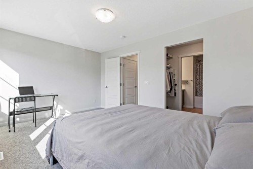 107-474 Seton Circle Se, Calgary, AB - Indoor Photo Showing Bedroom